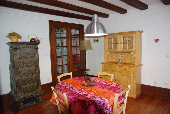 A spaccius dining room, decorated with engravings of Hansi